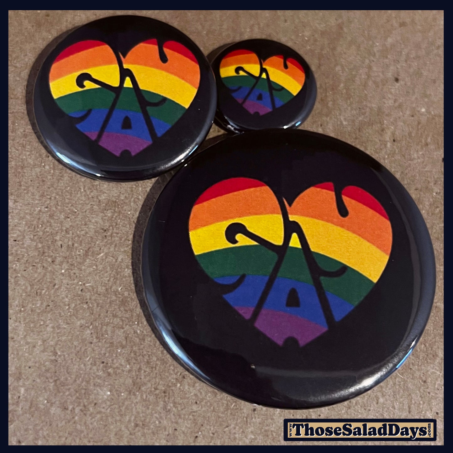 Three buttons of a Pro Gay Rights Message. One size is 1", 1.5" and 2.25".