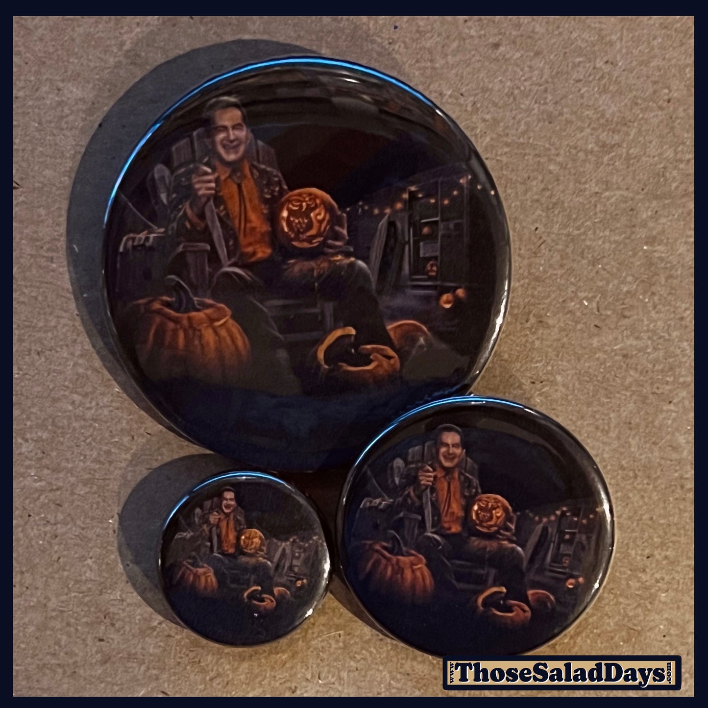 Three buttons of a Last Drive-In Image. One size is 1", 1.5" and 2.25".