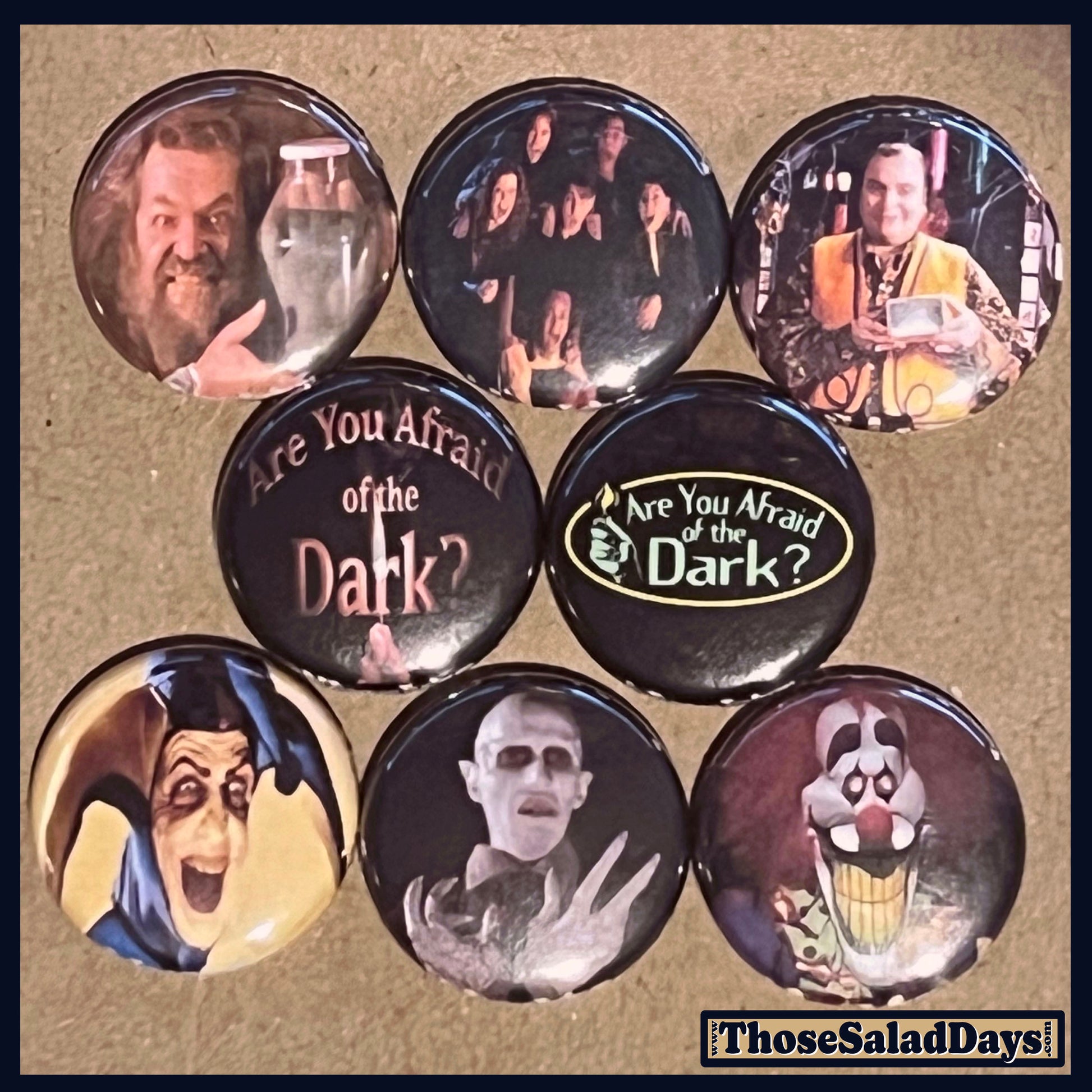 Set of buttons featuring characters and text from 'Are You Afraid of the Dark?' 