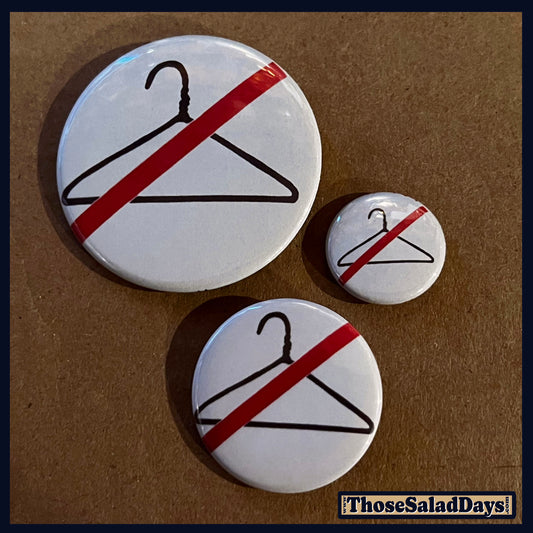 Three buttons with a no-hanger symbol on a brown background