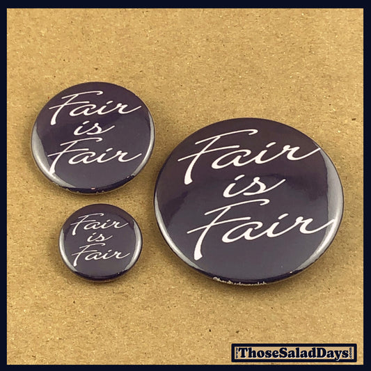 Three 'Fair is Fair' buttons on a textured beige background with 'Those Salad Days' branding.