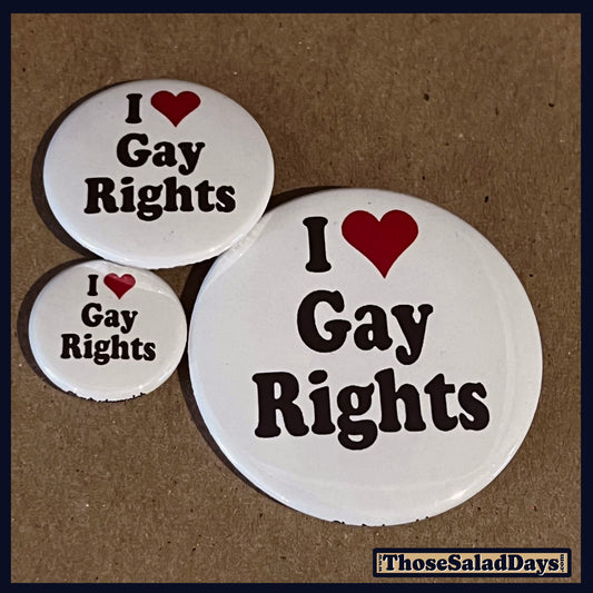 Three buttons of a Pro Gay Rights Message. One size is 1", 1.5" and 2.25".