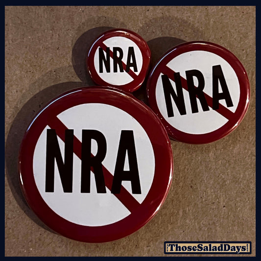 Three buttons of a Gun Reform Message. One size is 1", 1.5" and 2.25".