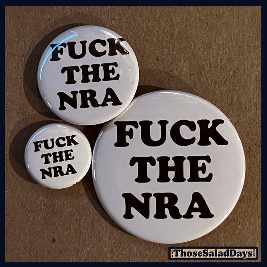 Three buttons of a Gun Reform Message. One size is 1", 1.5" and 2.25".