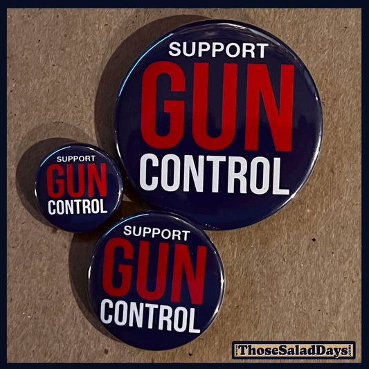 Three buttons of a Gun Reform Message. One size is 1", 1.5" and 2.25".