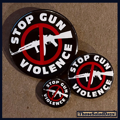 Three buttons of a Gun Reform Message. One size is 1", 1.5" and 2.25".