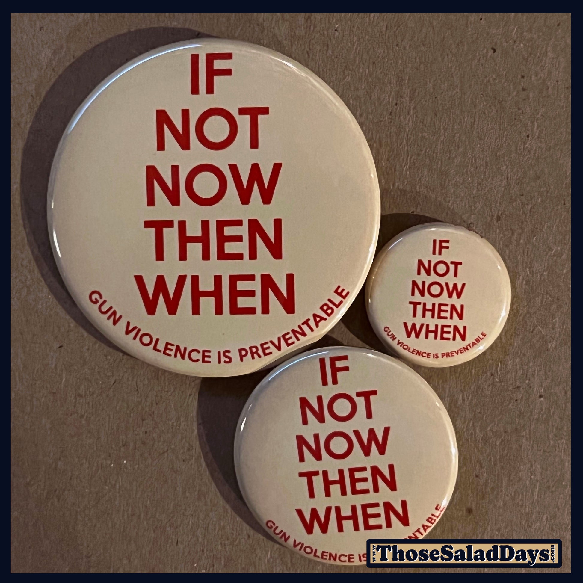 Three buttons of a Gun Reform Message. One size is 1", 1.5" and 2.25".