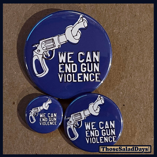 Three buttons of a Gun Reform Message. One size is 1", 1.5" and 2.25".