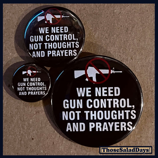 Three buttons of a Gun Reform Message. One size is 1", 1.5" and 2.25".