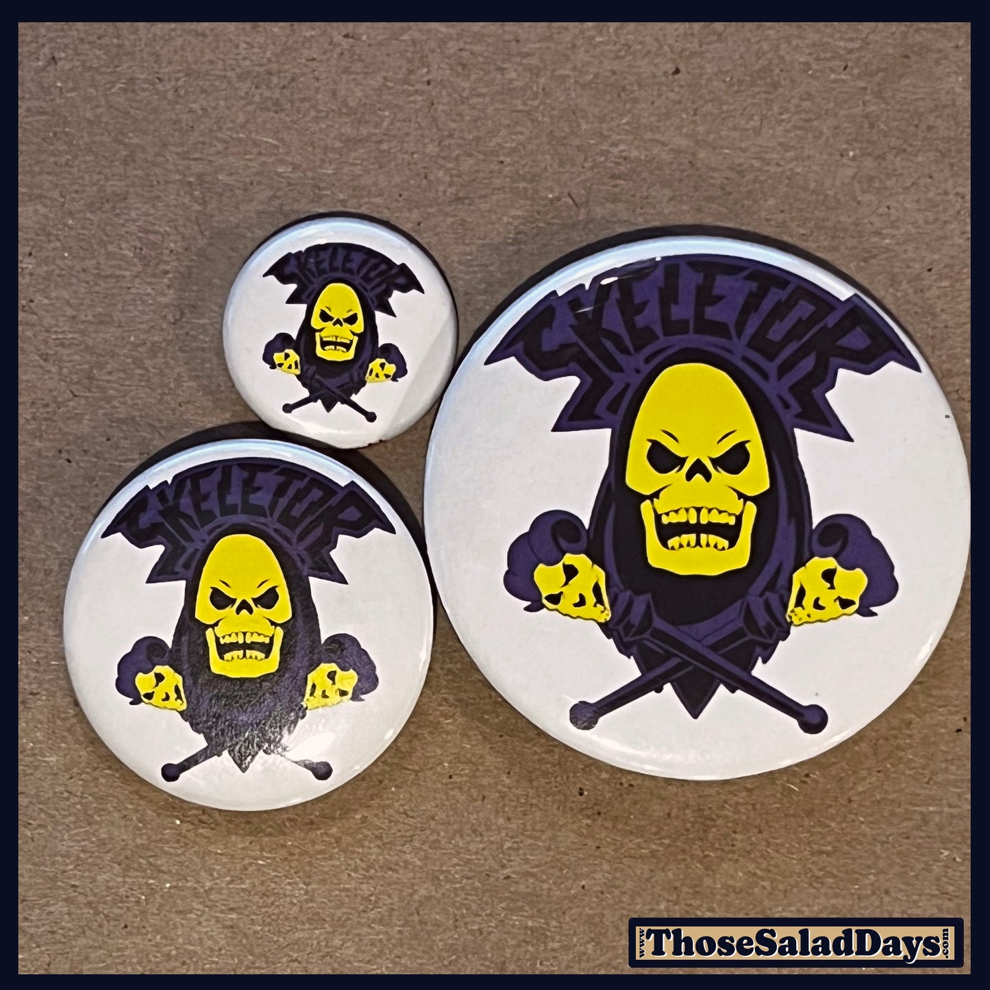 Skeletor and crossbones buttons