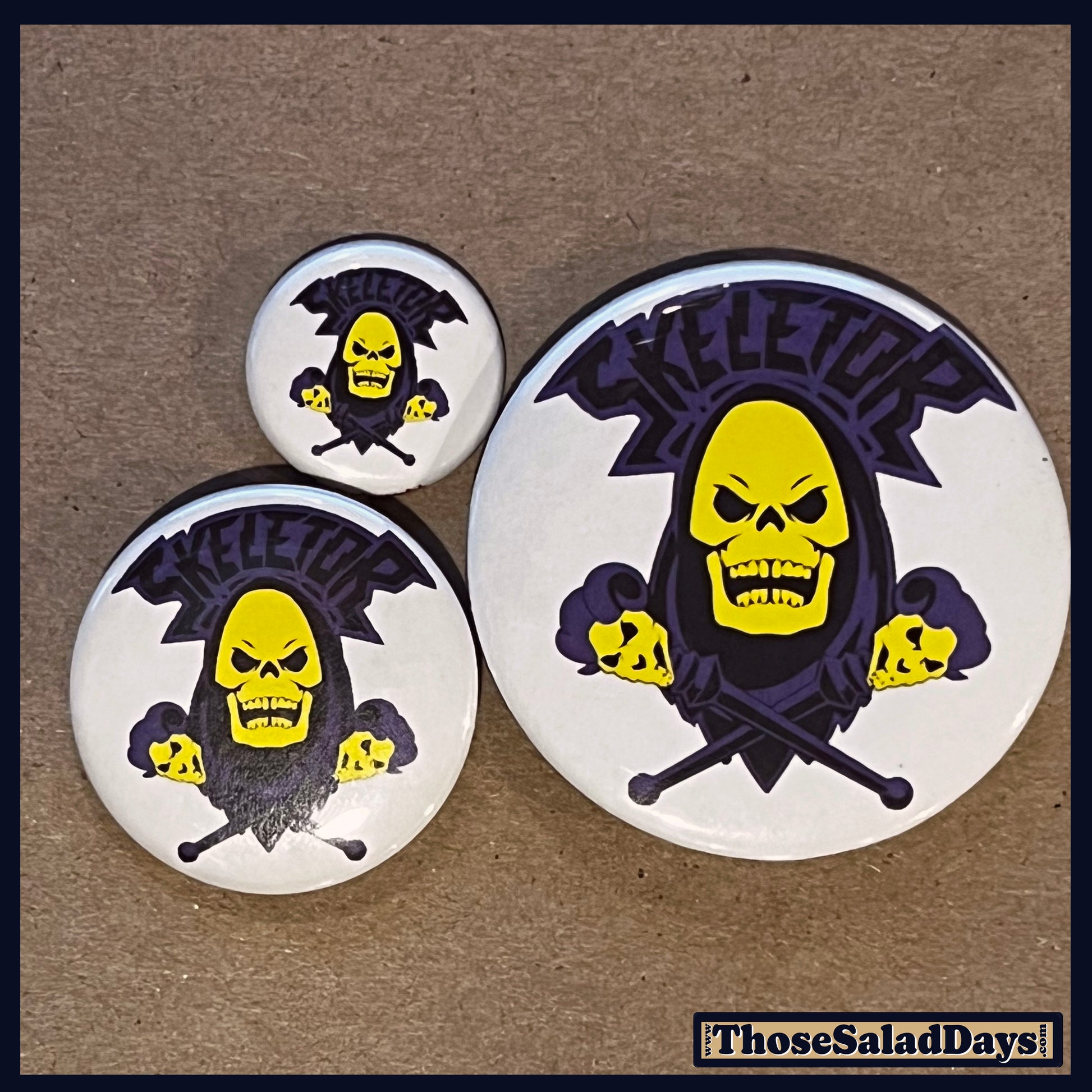 Skeletor and crossbones buttons