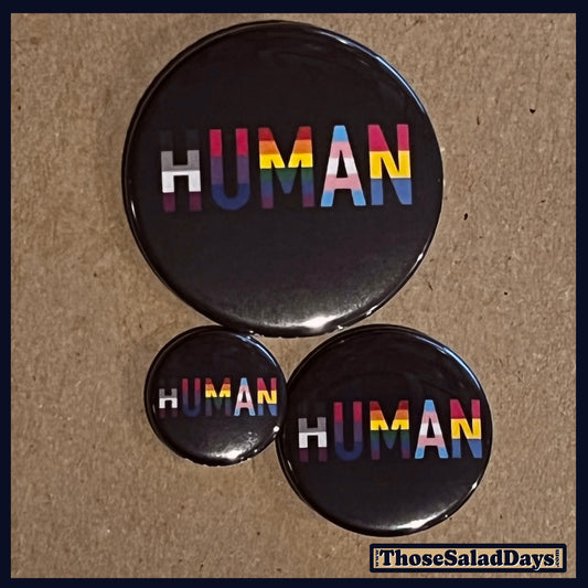 Three buttons of a Pro Gay Rights Message. One size is 1", 1.5" and 2.25".