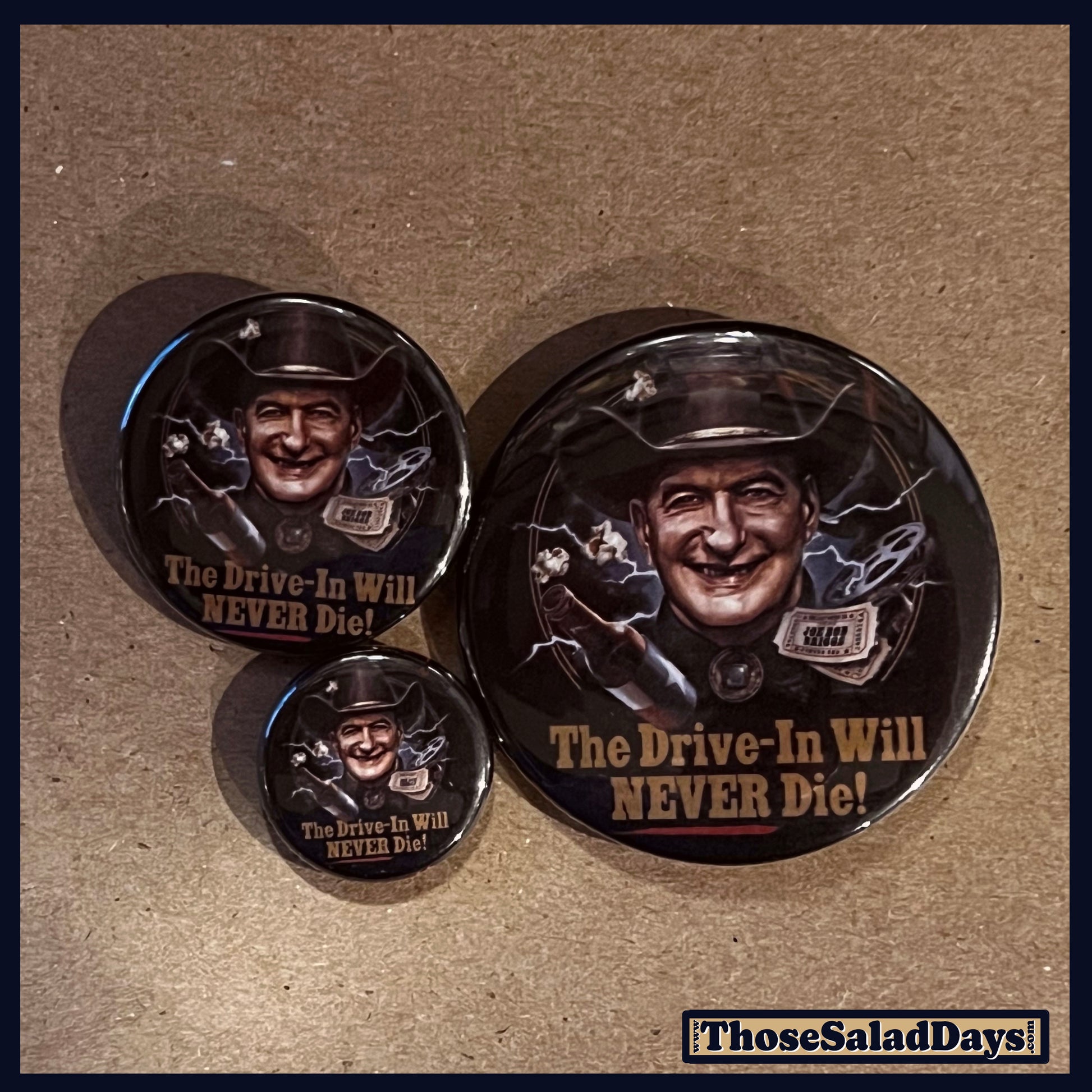 Three buttons of a Last Drive-In Image. One size is 1", 1.5" and 2.25".