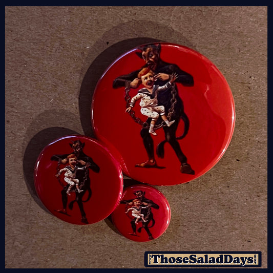 Three buttons of a Krampus Image. One size is 1", 1.5" and 2.25".