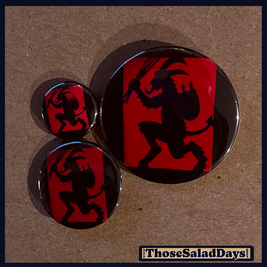 Three buttons of a Krampus Image. One size is 1", 1.5" and 2.25".