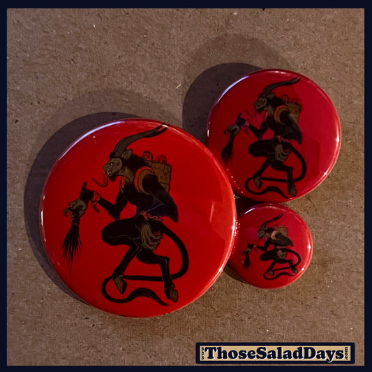 Three buttons of a Krampus Image. One size is 1", 1.5" and 2.25".