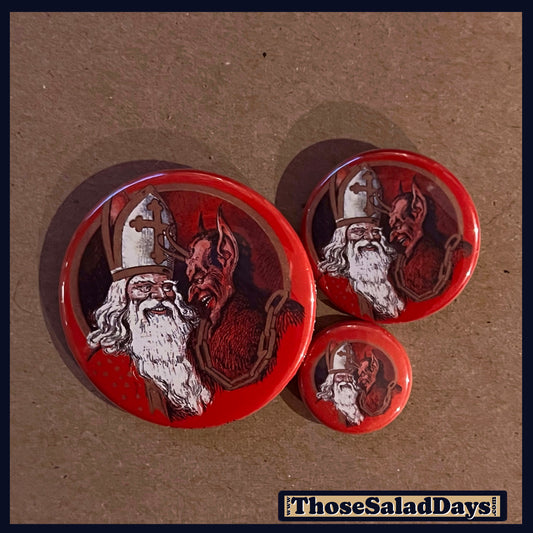 Three buttons of a Krampus Image. One size is 1", 1.5" and 2.25".