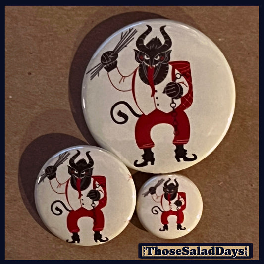 Three buttons of a Krampus Image. One size is 1", 1.5" and 2.25".