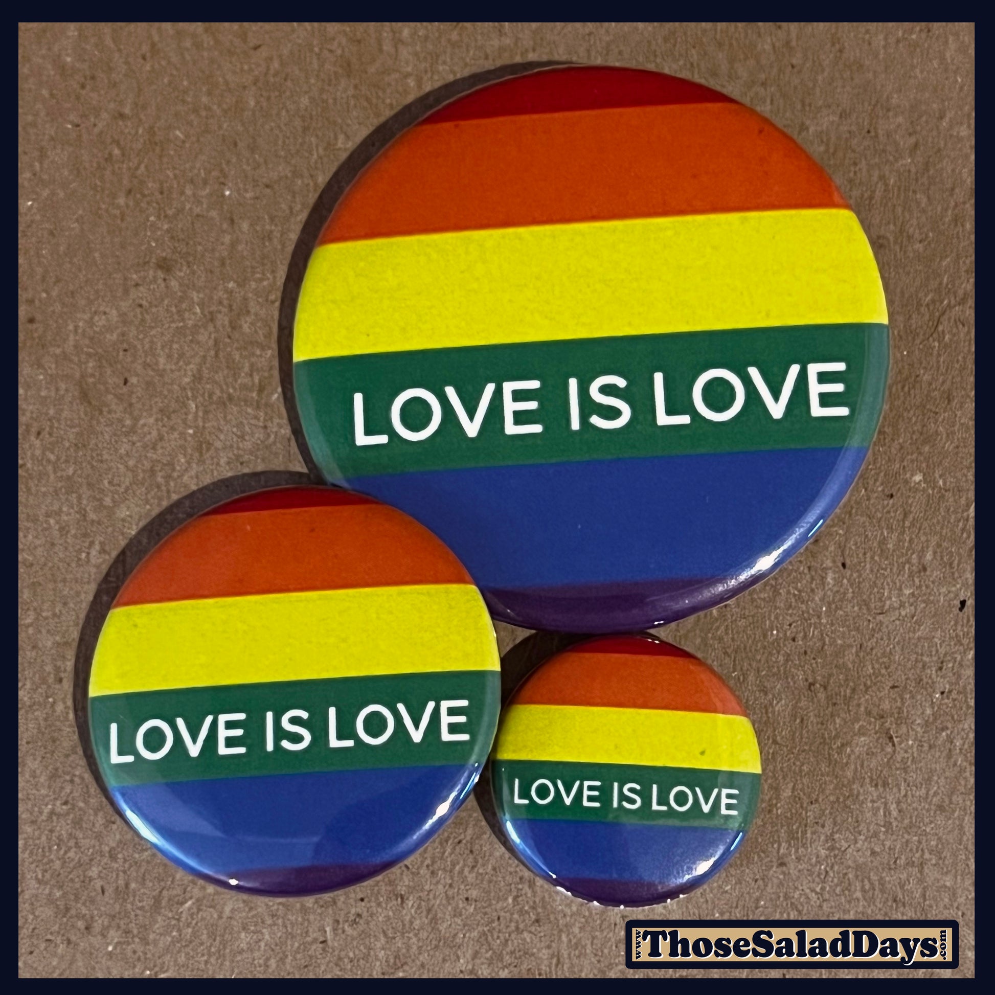 Three buttons of a Pro Gay Rights Message. One size is 1", 1.5" and 2.25".