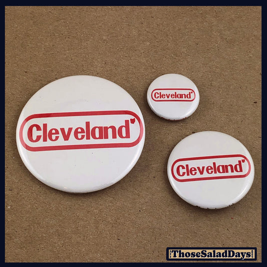 Three 'Cleveland NES' buttons on a brown background