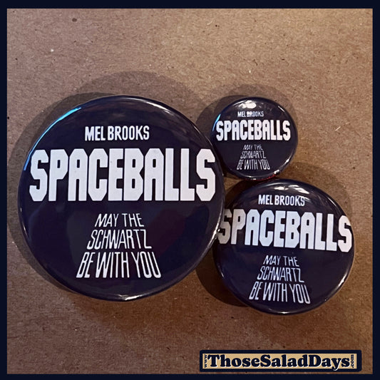 Three 'Spaceballs' themed buttons on a brown background