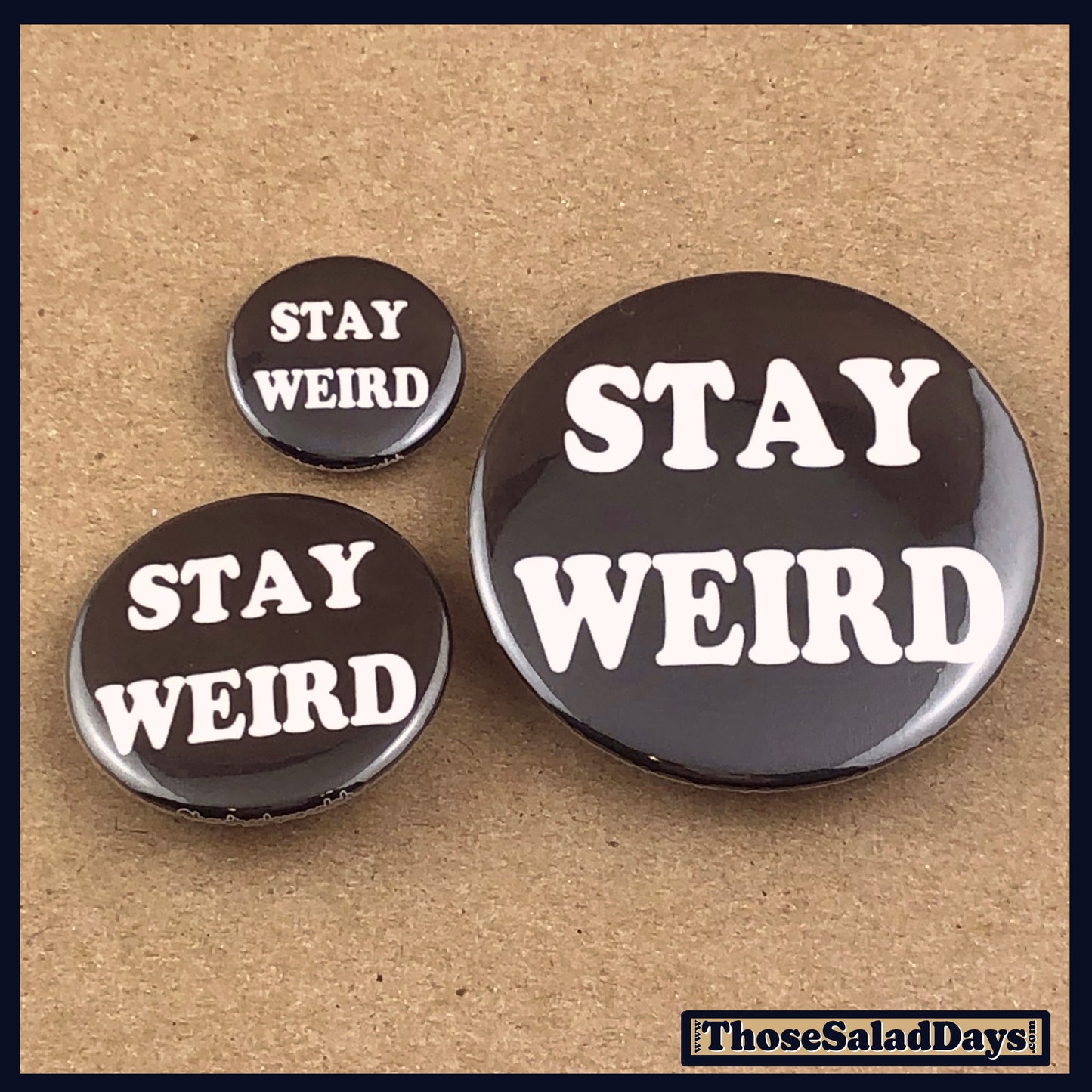 Three 'Stay Weird' buttons on a brown background with 'Those Salad Days' branding.