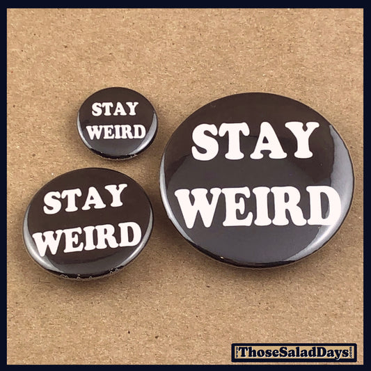 Three 'Stay Weird' buttons on a brown background with 'Those Salad Days' branding.