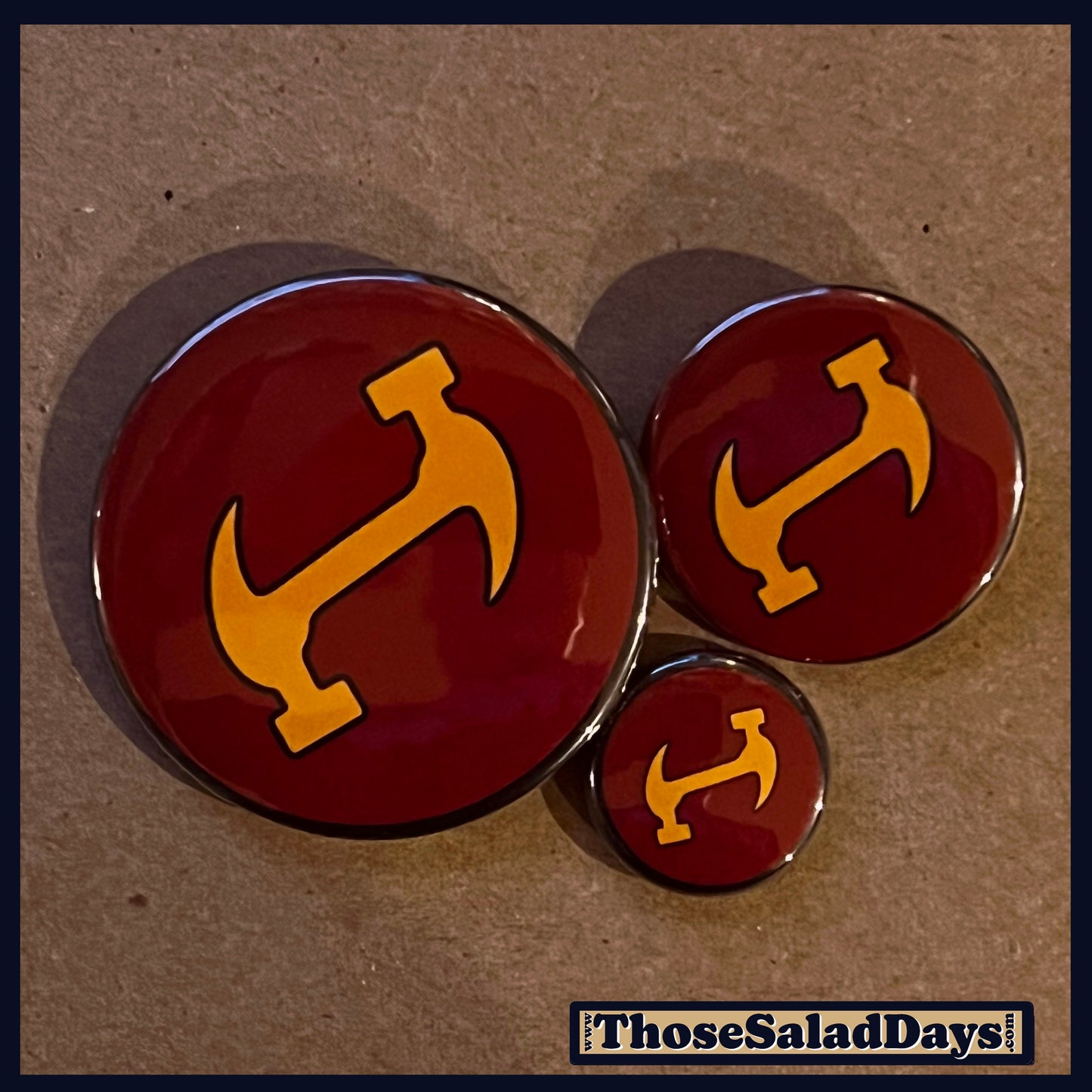 Stonecutters logo on pins