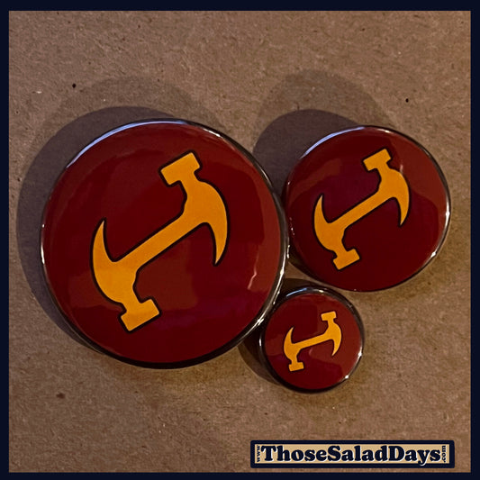 Stonecutters logo on pins